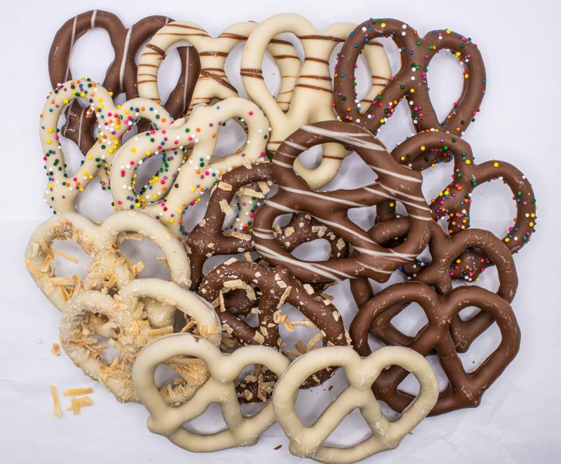 Assorted Pretzels 1/2lb, with white Chocolate, Milk Chocolate Covered Pretzels and some with toppings like coconut and drizzles from Hansel and Gretel Candy Kitchen Helen Georgia