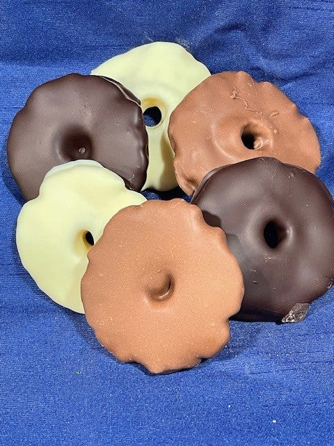 Chocolate Covered Pineapple Rings in white chocolate, milk chocolate and dark chocolate at hansel and gretel candy kitchen 