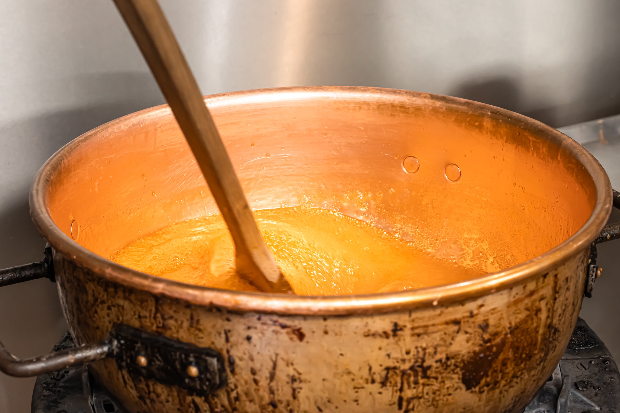 Copper pot with melted brittle being cooked,Hansel and Gretel Candy Kitchen, Helen Georgia