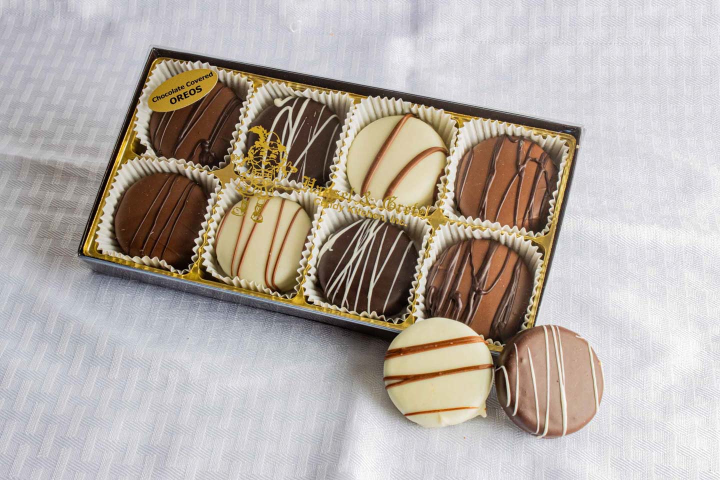 Hansel and Gretel 8pc Chcocolate Covered Oreos Custom Box on a white table cloth, from Hansel and Gretel Candy Kicthen, Helen Georgia