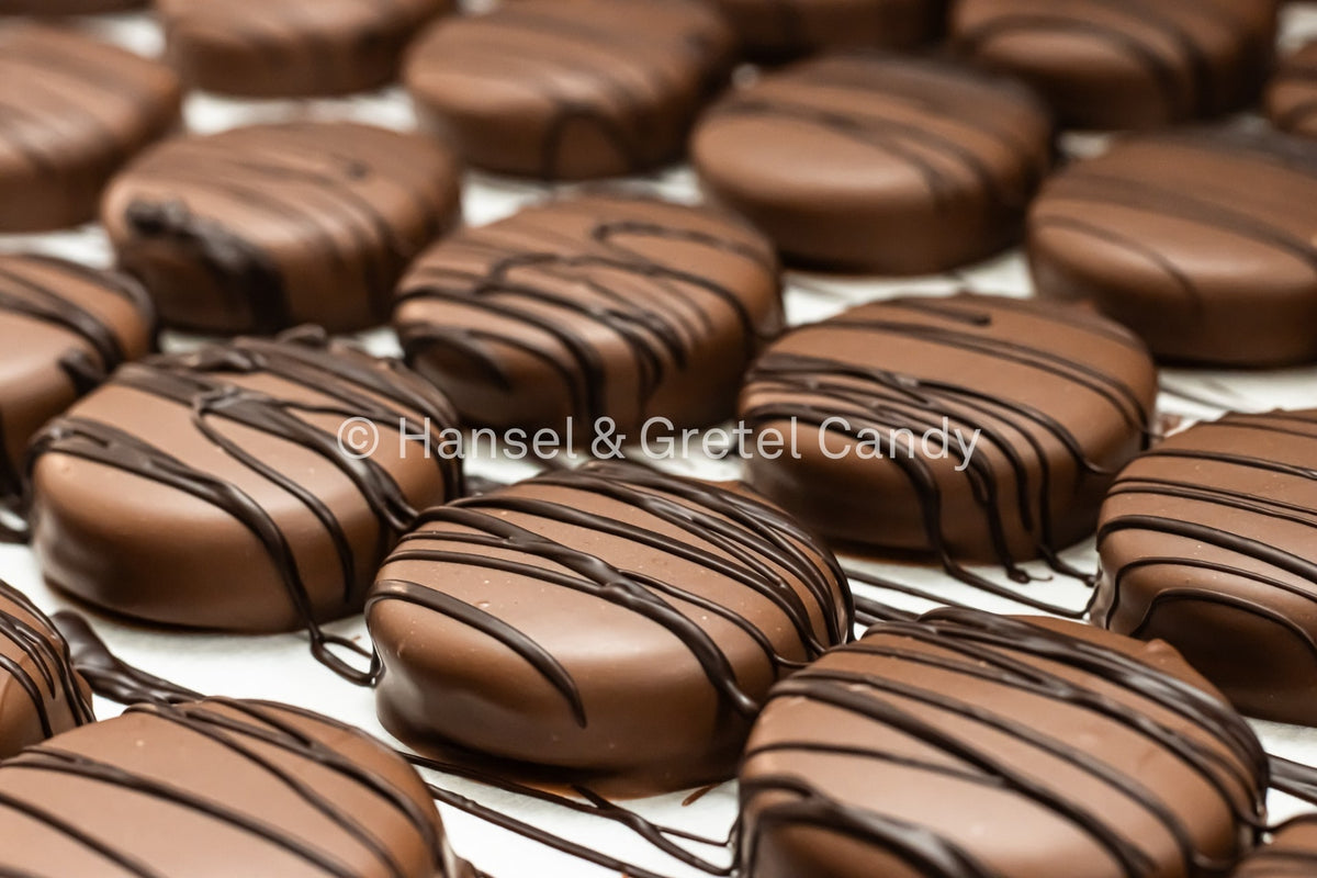 Hansel & Gretel Chocolate Covered Oreos Cooling on Cooking Sheet