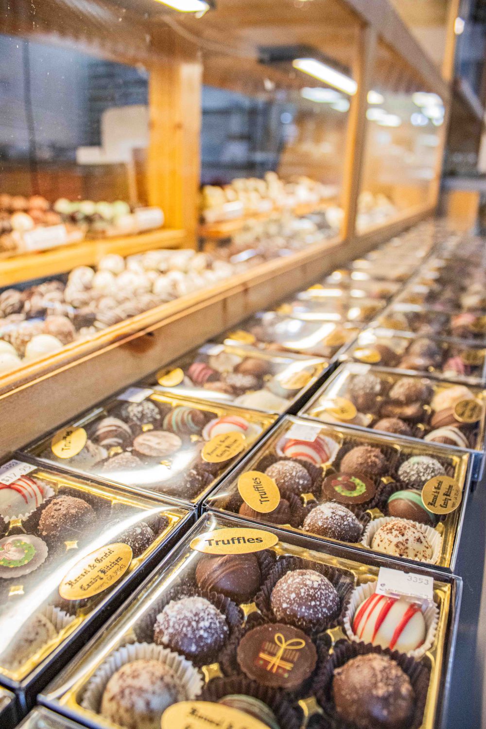 2 rows of 9pc assorted truffles in a display case at hansel and gretel candy kitchen helen georgia