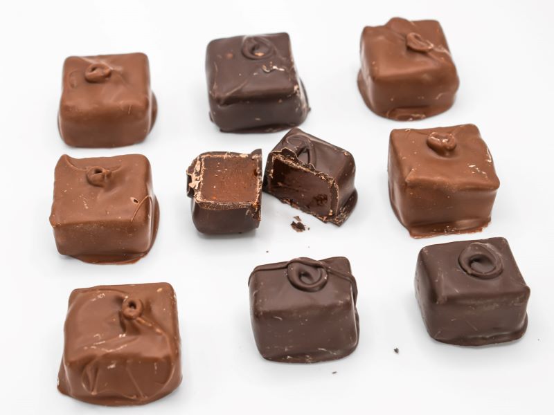 9 Chocolate Covered Jellies on a white table with the jelly in the center cut inhalf from Hansel and Gretel Kitchen Helen Georgia