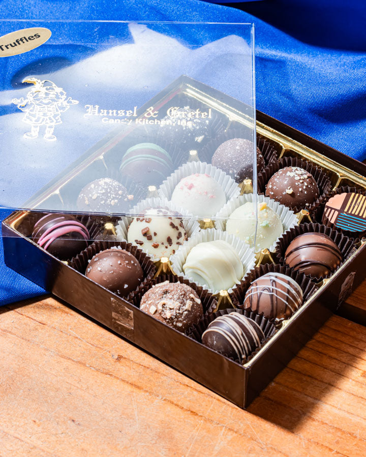 16pc Custom Truffle Box with the lid on the top of the box to the side from Hansel and Gretel Candy Kitchen Helen Georgia