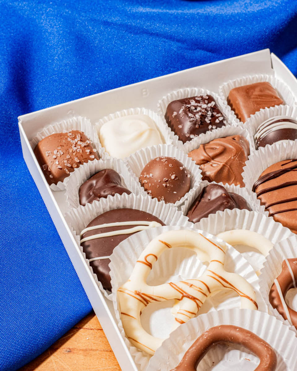 The Weekend Box with the lid removed showing an assortment of chocolates from Hansel and Gretel Candy Kitchen Helen Georgia